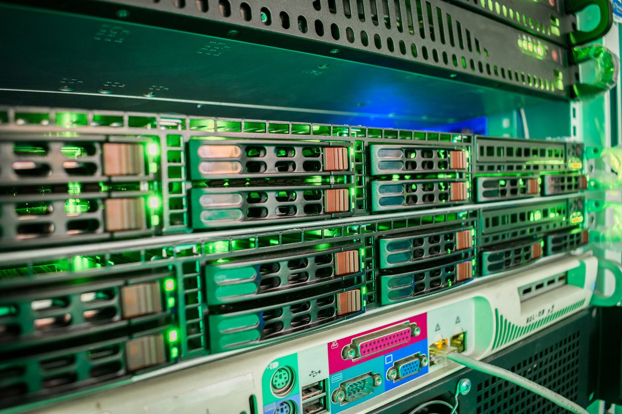 A rack with powerful data processing servers installed in the data center server room. Front panel of powerful computers. Interfaces between the device and the user A rack with powerful data processing servers installed in the data center server room. Front panel of powerful computers. Interfaces between the device and the user
